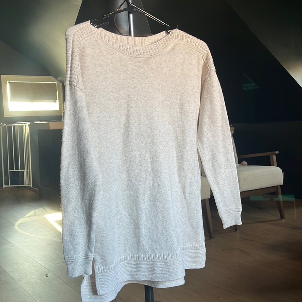 Long cream sweater